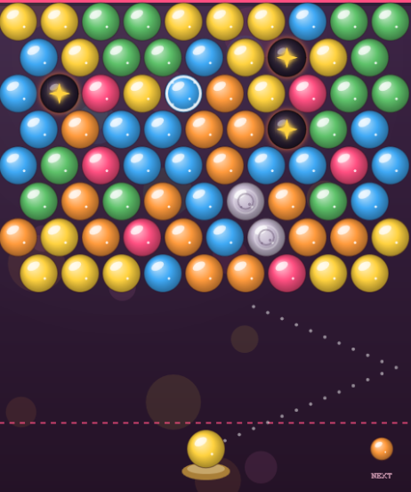 A Bubble Pop board showing the aiming guide along with the special bubbles &mdash; a wrapped bubble, a stone jawbreaker and a bomb.
